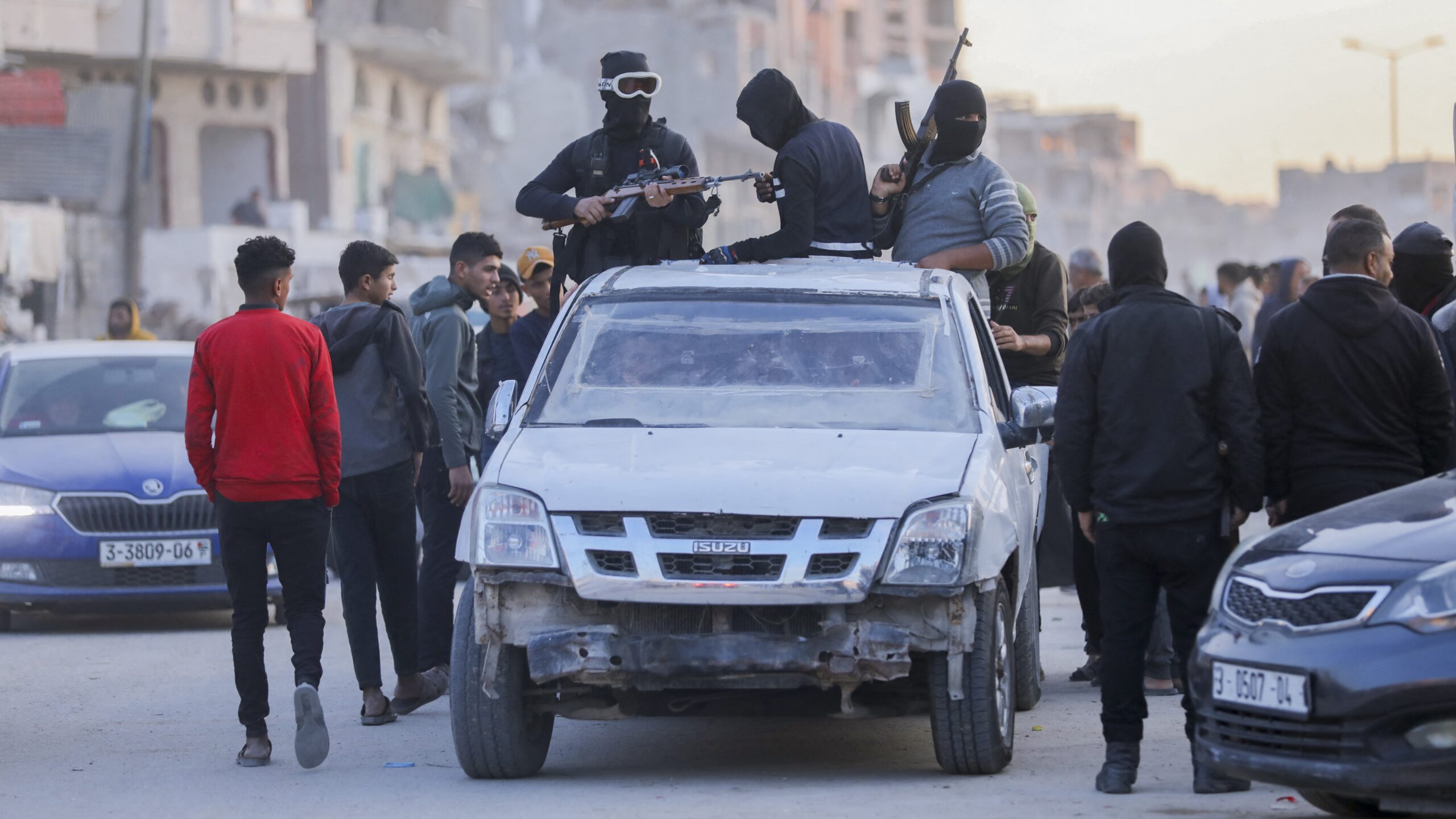 Members of the terrorist organization Hamas parading following the ceasefire with Israel in Deir Al-Balah, Gaza, on 19 January 2025